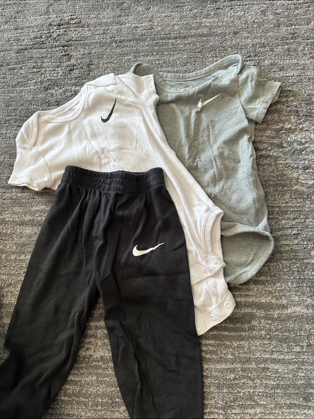 Nike Kids bundle Black Jogger Pants with 2 bodysuits.